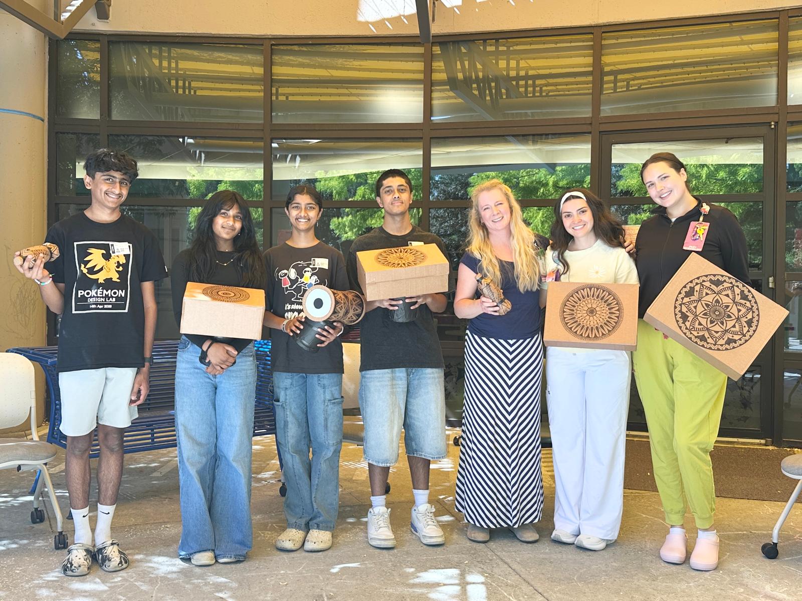 The Eco Beats team with handmade box drums at Seattle Children’s Hospital